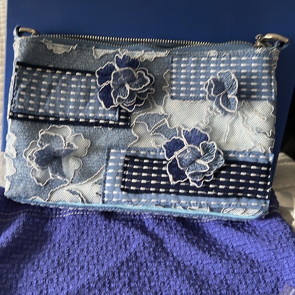 Tadashi Shoji stitched peony clutch